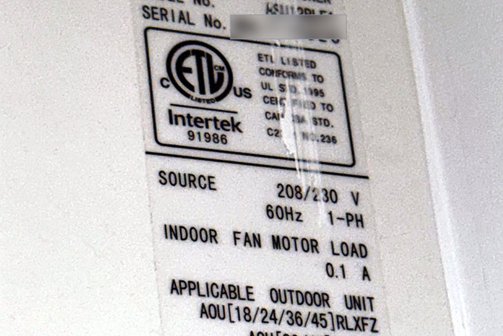 Data plate reading Fujitsu split type air conditioner model ASU12RLF1, 208 to 230 volts, single phase, with the serial number redacted