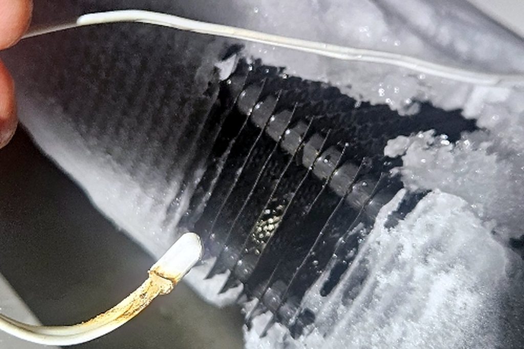 Walk-in evaporator coil frosting over because the defrost cycle was running out of step
