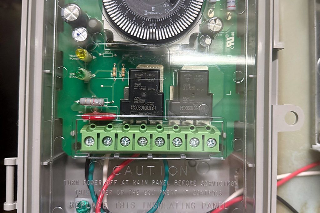 The new Intermatic electronic defrost timer: two relays, an eight-terminal block and a 24-hour dial, with no clock motor to wear out.