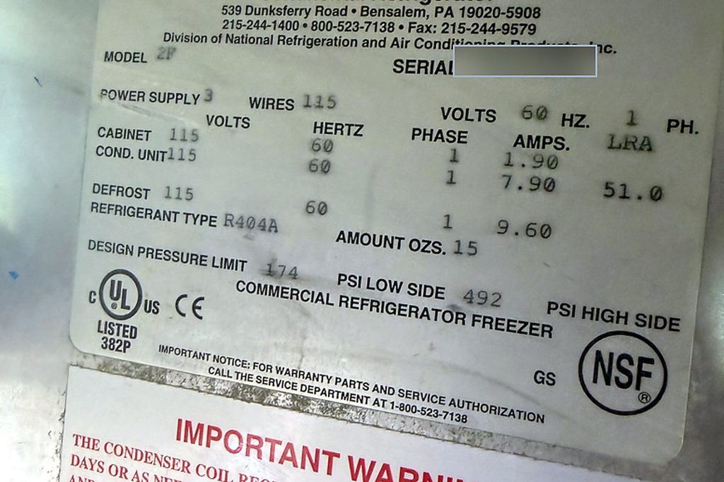The Continental 2F data plate: 115 V single phase, R-404A, 15 oz charge, condensing unit 7.9 A, defrost circuit 9.6 A.