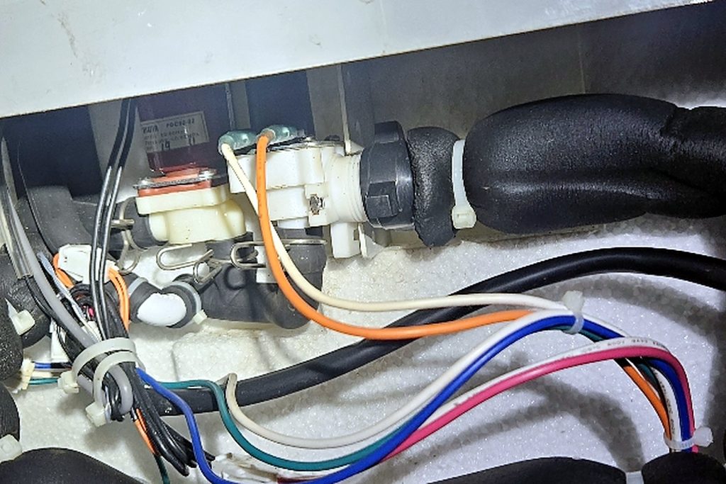 Water inlet valve and wiring harness inside the Hoshizaki undercounter ice machine